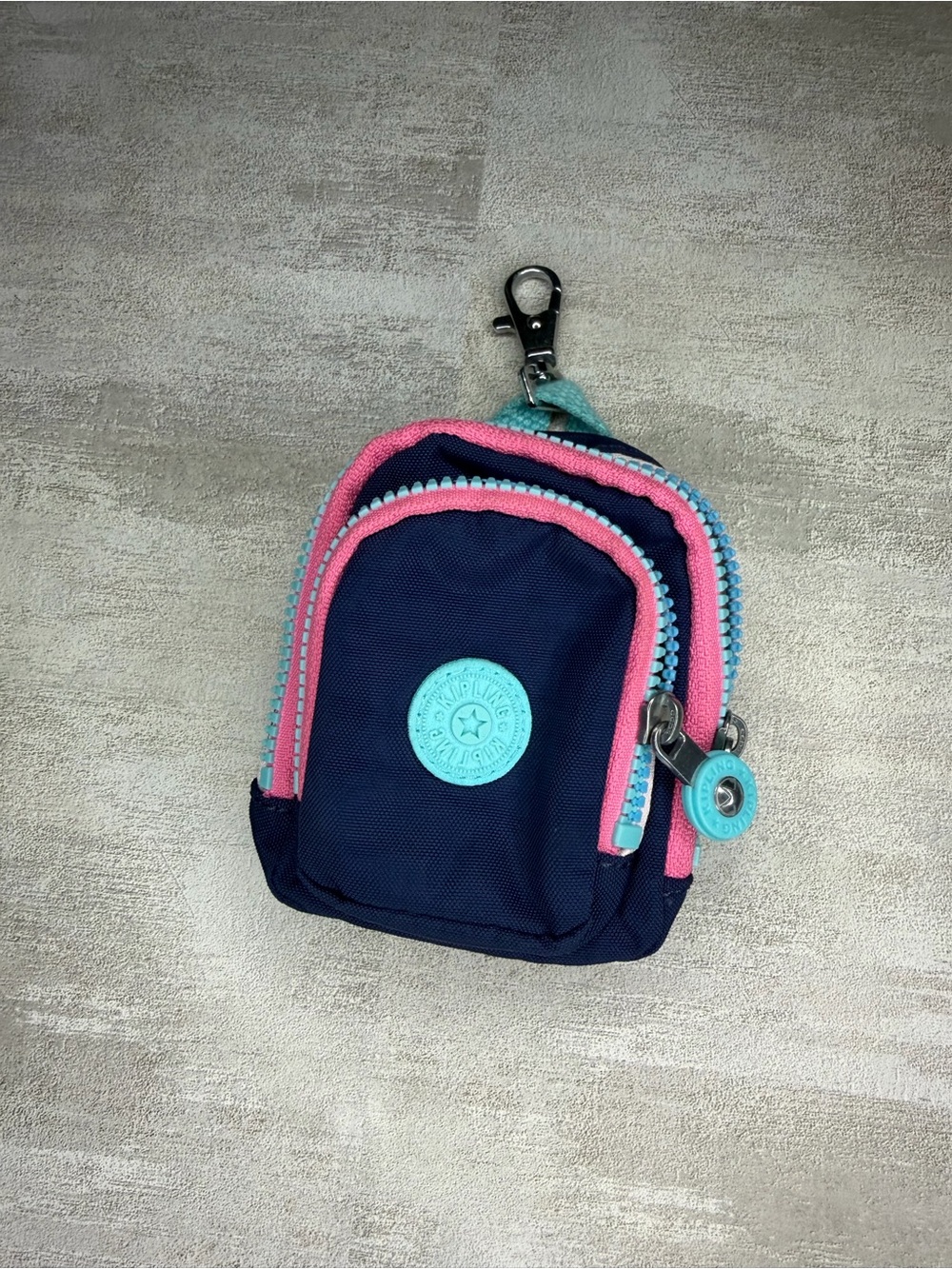 Kipling Navy Mini Backpack Keychain with Pink & Light Blue Accents